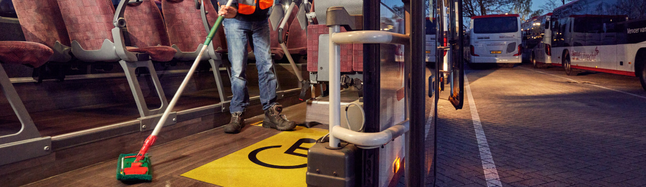 cleaning the interior of a city bus with probiotic cleaning products
